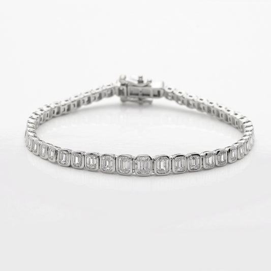 14KW 6.00CTW EMERALD DIAMOND BEZEL SET GRADUATED