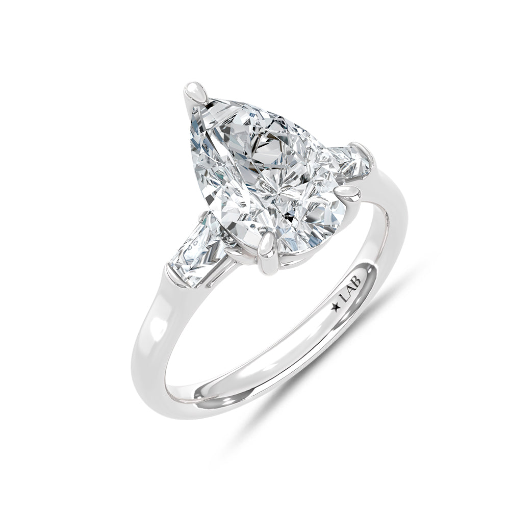 14K White Gold Lab Grown Diamond 3 1/5 Ct.Tw. Pear and Tapper Three Stone Engagement Ring